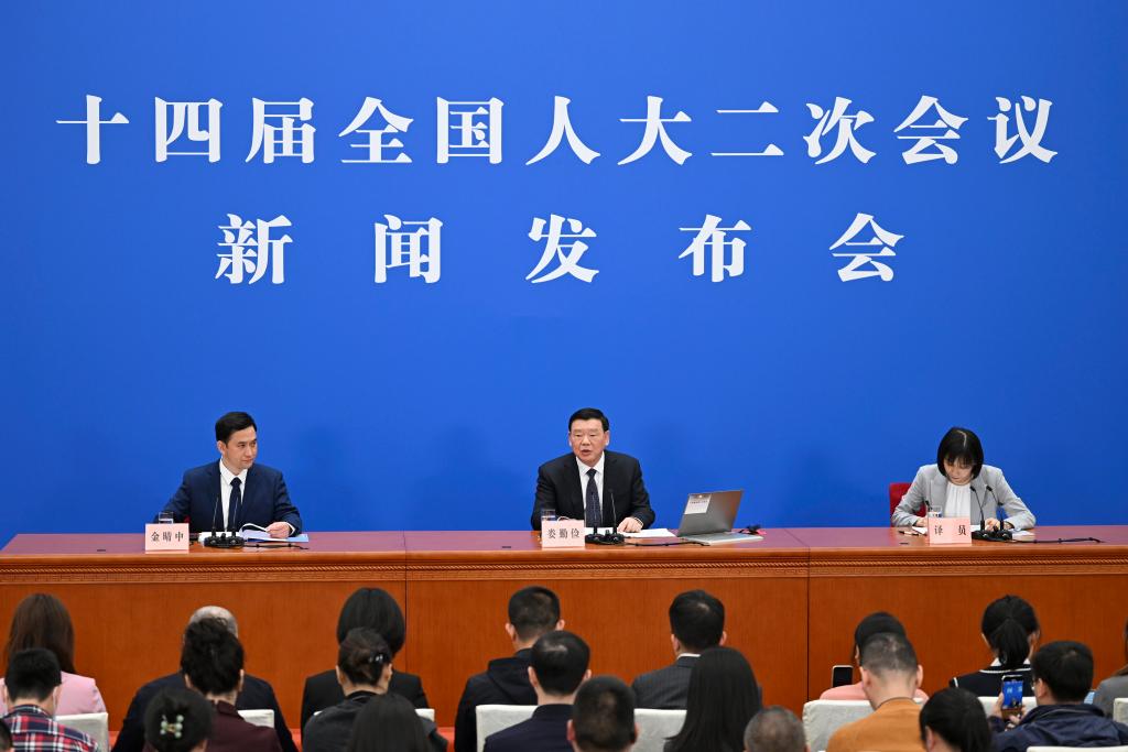 3月4日，十四屆全國人大二次會議在北京人民大會堂舉行新聞發(fā)布會。大會發(fā)言人婁勤儉就大會議程和人大工作相關(guān)問題回答中外記者的提問。 新華社記者 牟宇 攝