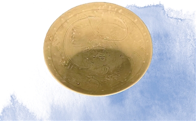 　南宋青釉刻花“吉”字碗。  　　中國國家版本館中央總館供圖